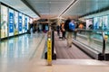 Dublin, Ireland Ã¢â¬â January 2019 Dublin airport, people rushing for their flights, long corridor with moving walkway, motion blur Royalty Free Stock Photo